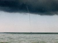 One of two water spouts off Sandspur Beach on April 13, 2011
